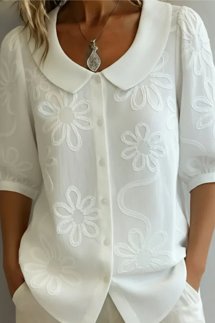 Marisa | Blusa con cuello de flores