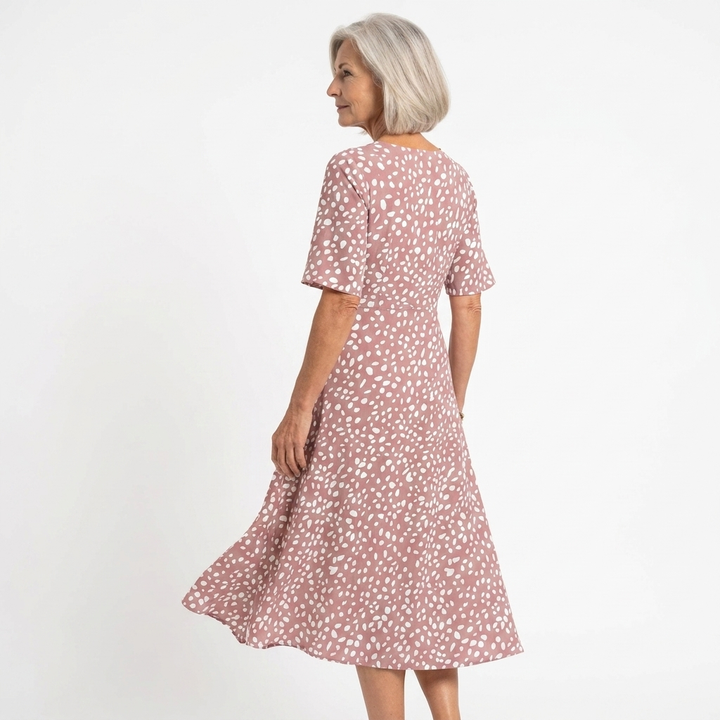 Colette | Vestido midi fluido con estampado de lunares y efecto reductor