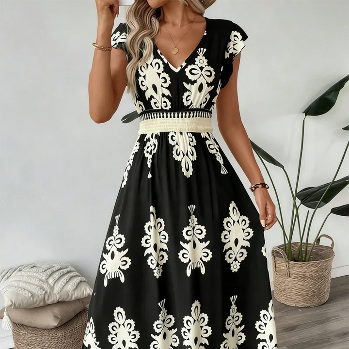 Candela | Vestido maxi barroco con escote en V